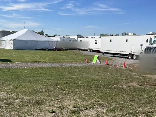 Production trailers and a tent at base camp